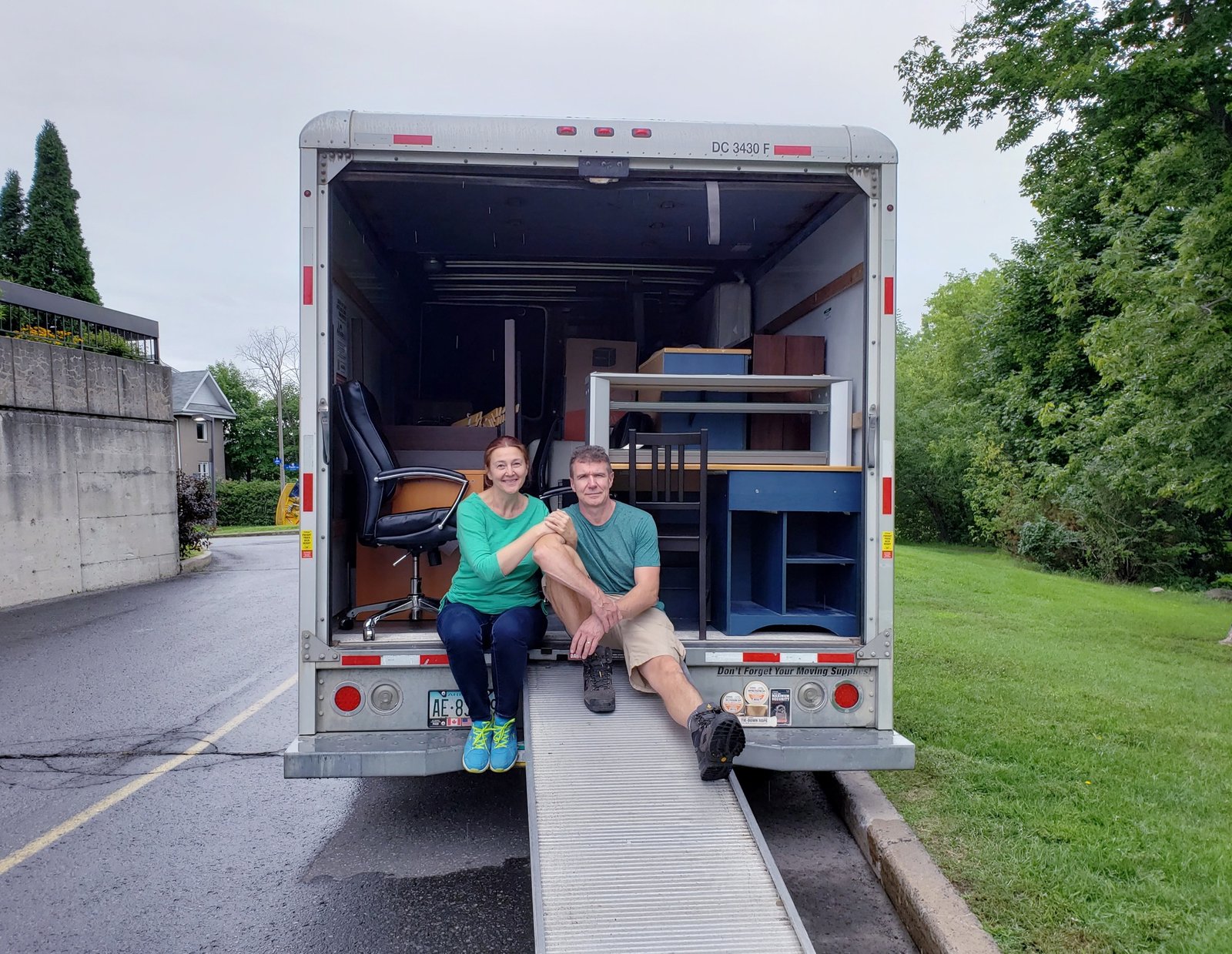 Couple is ready to move in new place, move, truck filled with furniture, changing appartement