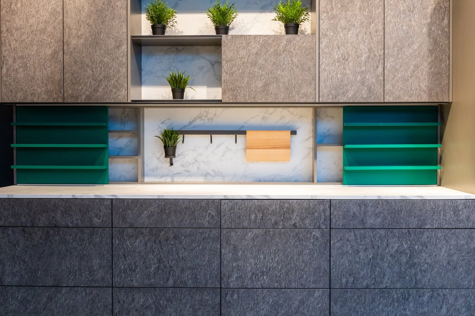 Modern kitchen cabinet with marble backsplash and shelves